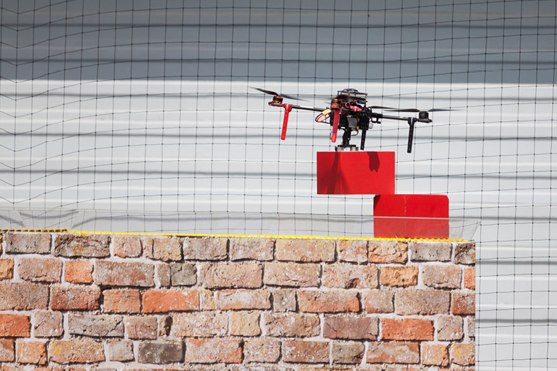 Drone laying bricks